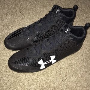 Under Armour Nitro Select Mid Cleats. All black.